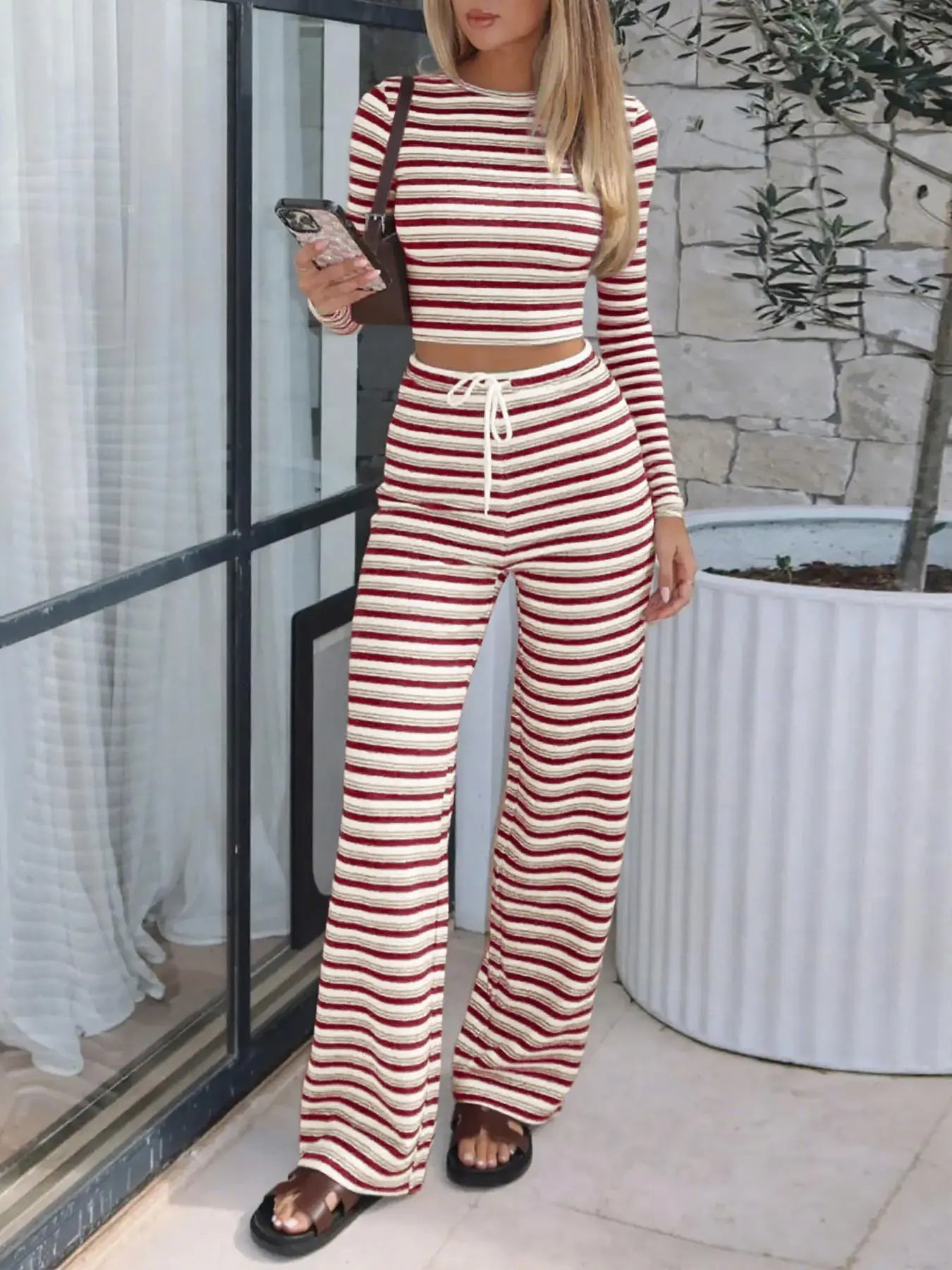 Elevate Your Everyday Style with Our Women's Striped Long Sleeve Top and Relaxed Printed Pants Set