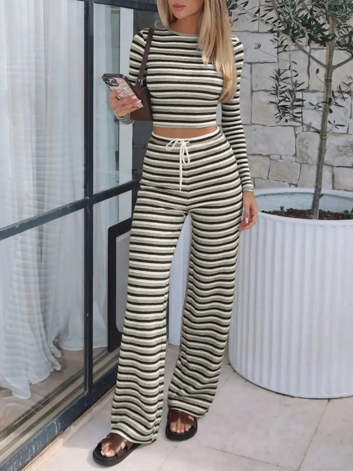 Elevate Your Everyday Style with Our Women's Striped Long Sleeve Top and Relaxed Printed Pants Set